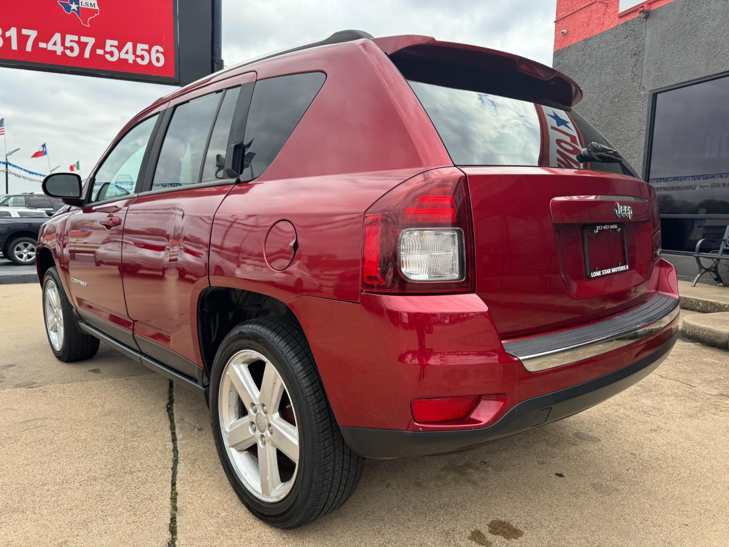 2014 RED /Black JEEP COMPASS LATITUDE Latitude 4dr SUV (1C4NJCEA3ED) with an 2.0L I4 engine, CVT transmission, located at 5900 E. Lancaster Ave., Fort Worth, TX, 76112, (817) 457-5456, 0.000000, 0.000000 - This is a 2014 JEEP COMPASS Latitude 4 DR SUV that is in excellent condition. The interior is clean with no rips or tears or stains. All power windows, door locks and seats. Ice cold AC for those hot Texas summer days. It is equipped with an AM/FM radio, AUX port, Bluetooth connectivity and Sirius X - Photo#6